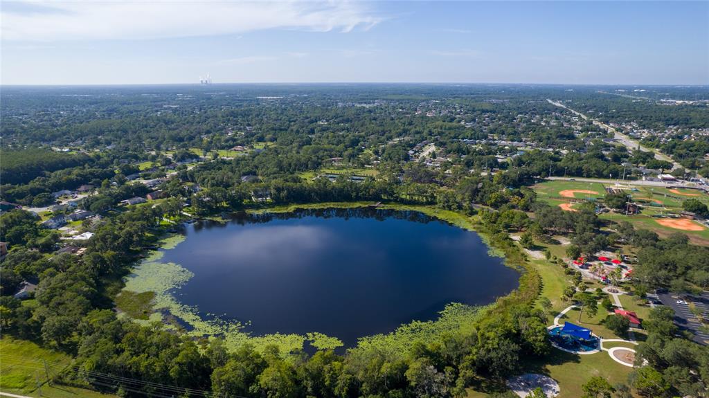 1813 North Dean Road Orlando, FL 32817 - Photo 33 of 35 an aerial view of a residential houses with outdoor space and trees