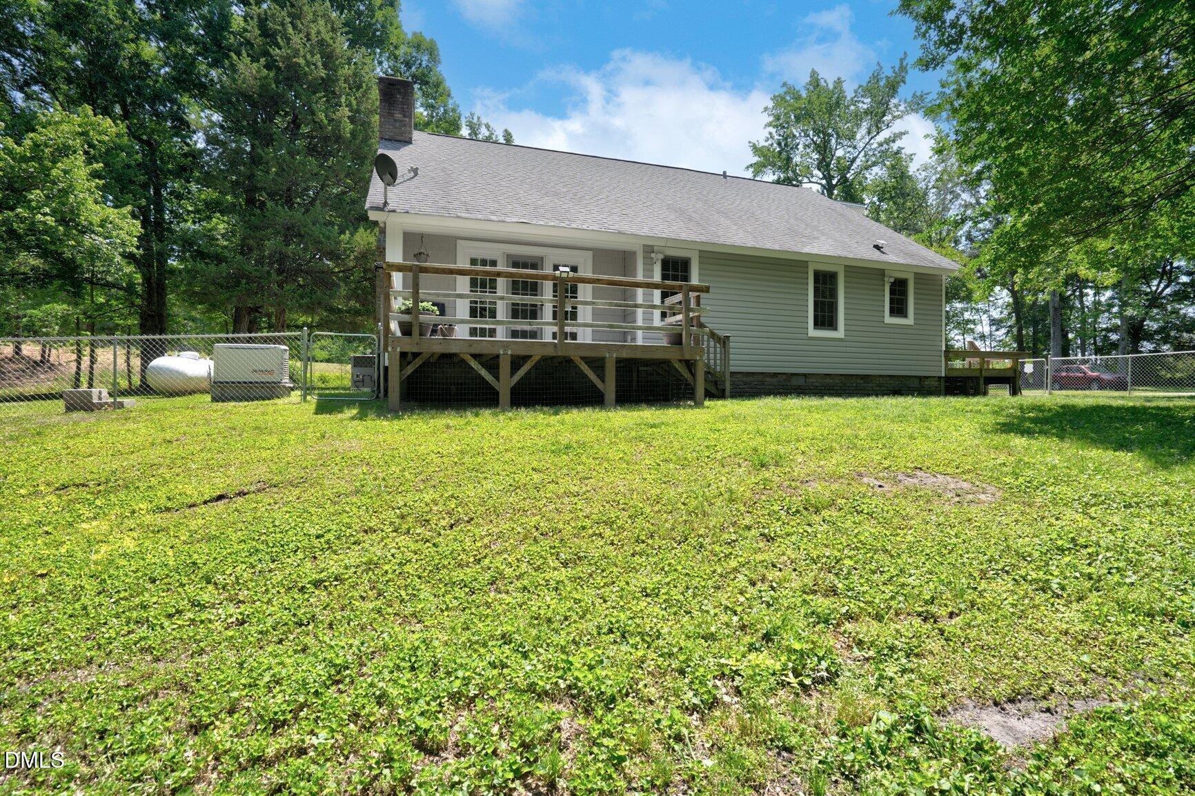 726 Thomas Road Rocky Mount, NC 27801 - Photo 38 of 55 a view of a house with a yard