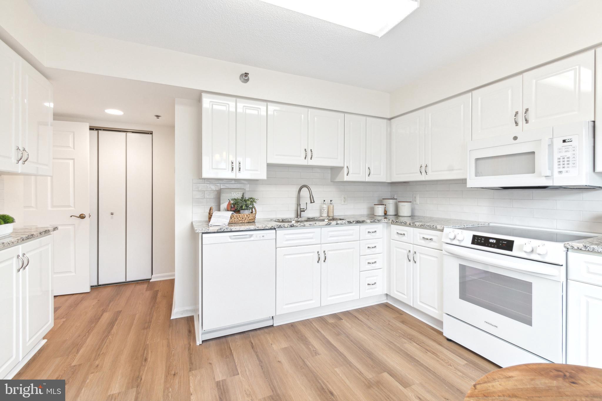14809 Pennfield Circle, Unit 304 Silver Spring, MD 20906 - Photo 13 of 29 New ceramic tile backsplash and granite tops