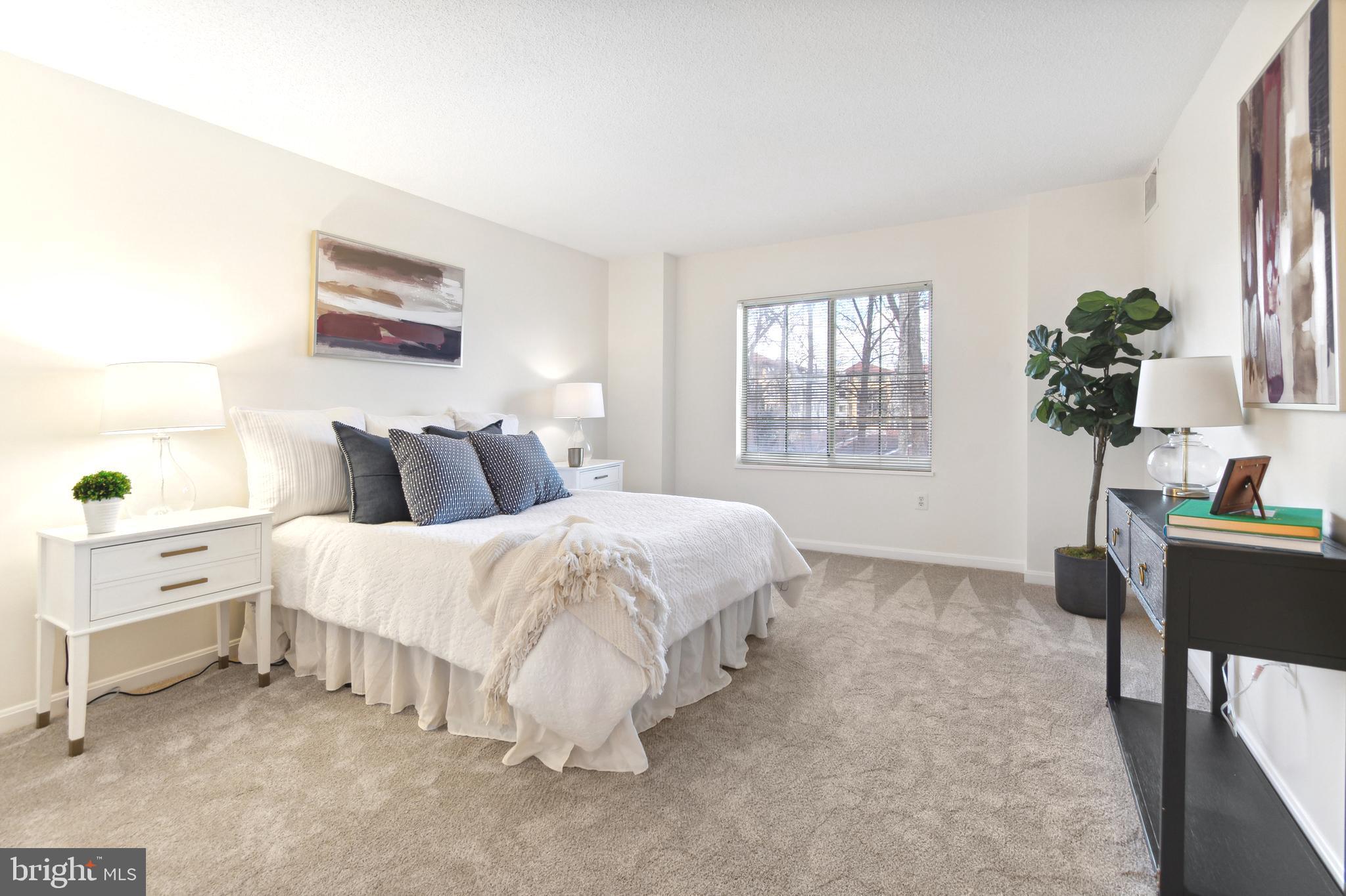 14809 Pennfield Circle, Unit 304 Silver Spring, MD 20906 - Photo 18 of 29 Large principal bedroom with ensuite bathroom