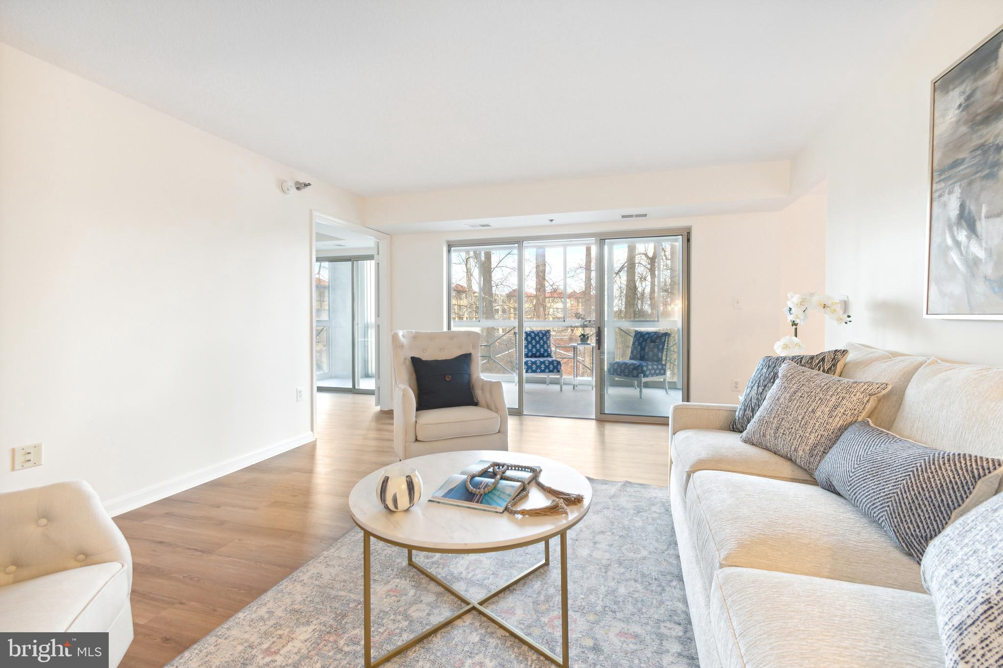 14809 Pennfield Circle, Unit 304 Silver Spring, MD 20906 - Photo 4 of 29 Light filled living room