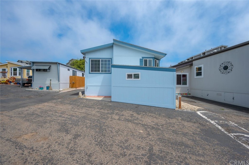 2531 Cienaga Street, Unit 3 Oceano, CA 93445 - Photo 3 of 18 a view of a house with a garage
