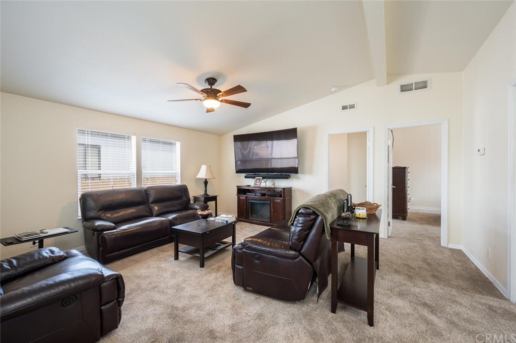 2531 Cienaga Street, Unit 3 Oceano, CA 93445 - Photo 6 of 18 a living room with furniture and a flat screen tv