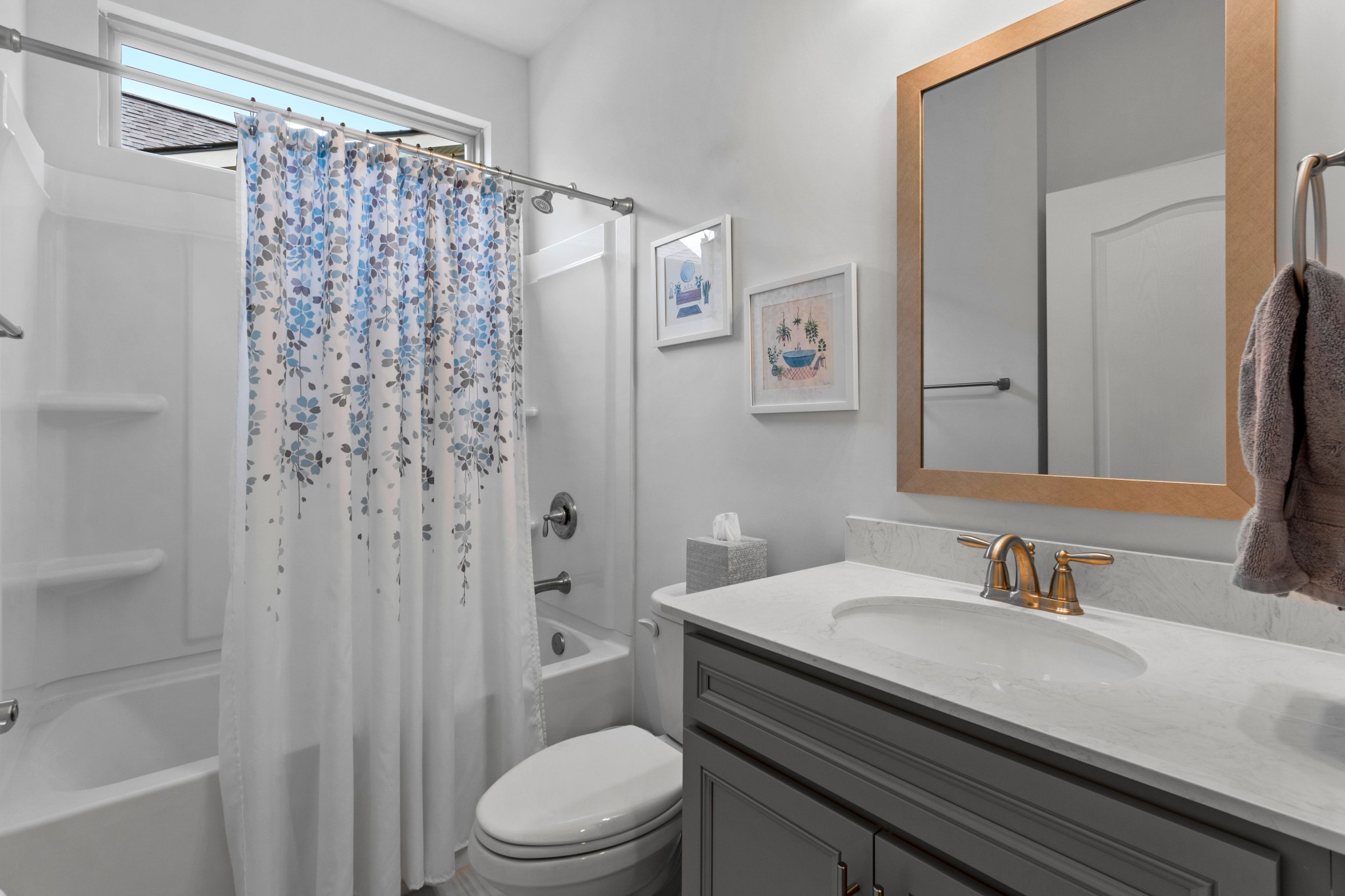 1331 Madison Lane Spring Hill, TN 37174 - Photo 24 of 61 a bathroom with a granite countertop sink toilet a mirror a vanity and shower