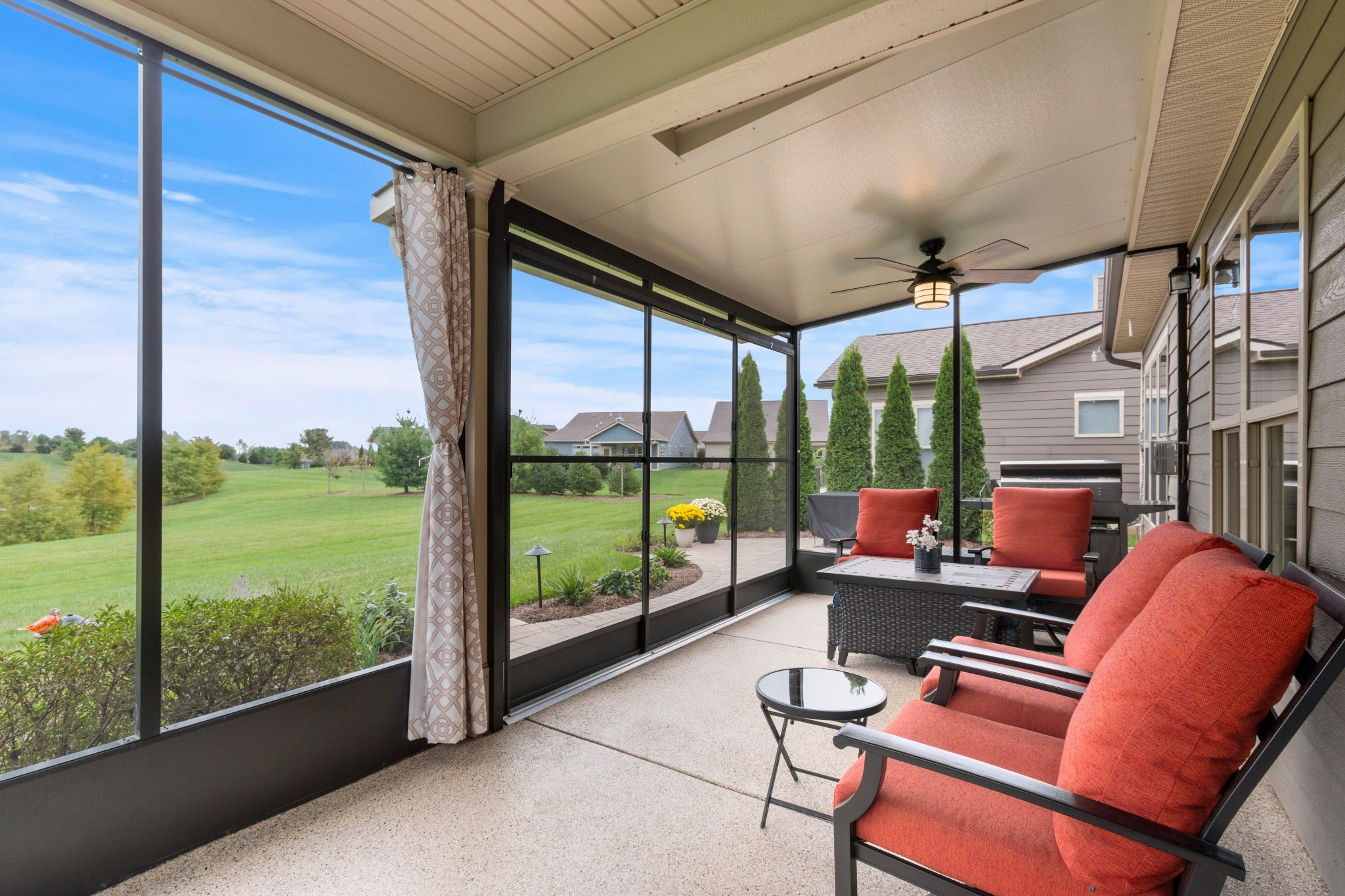1331 Madison Lane Spring Hill, TN 37174 - Photo 38 of 61 a living room with patio furniture and a floor to ceiling window
