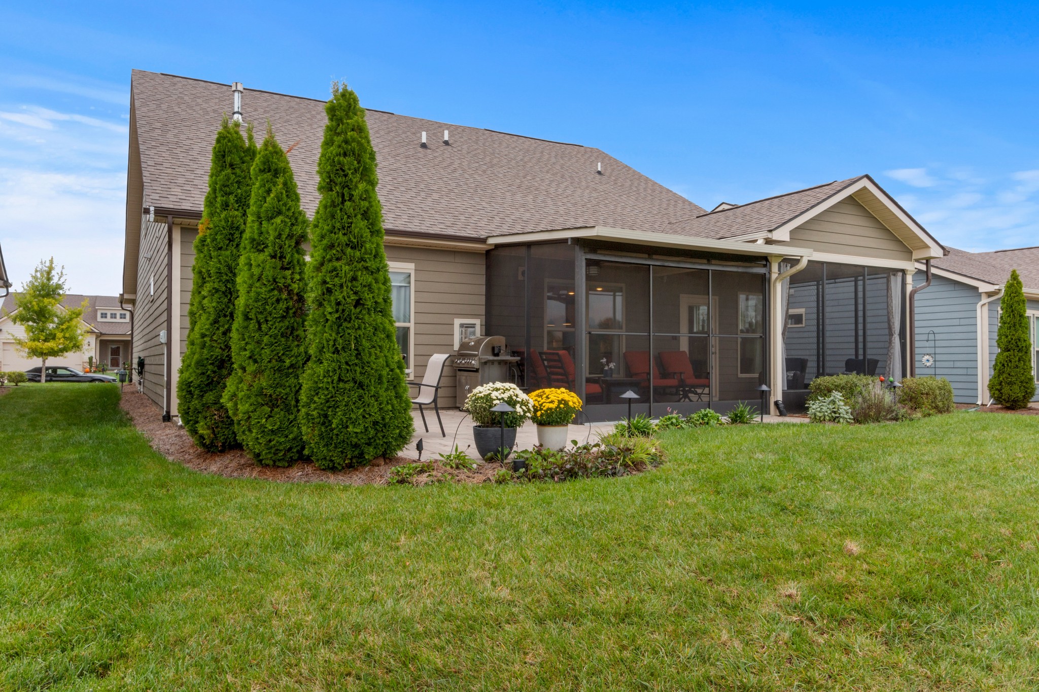 1331 Madison Lane Spring Hill, TN 37174 - Photo 44 of 61 a view of a chair and table in backyard of the house