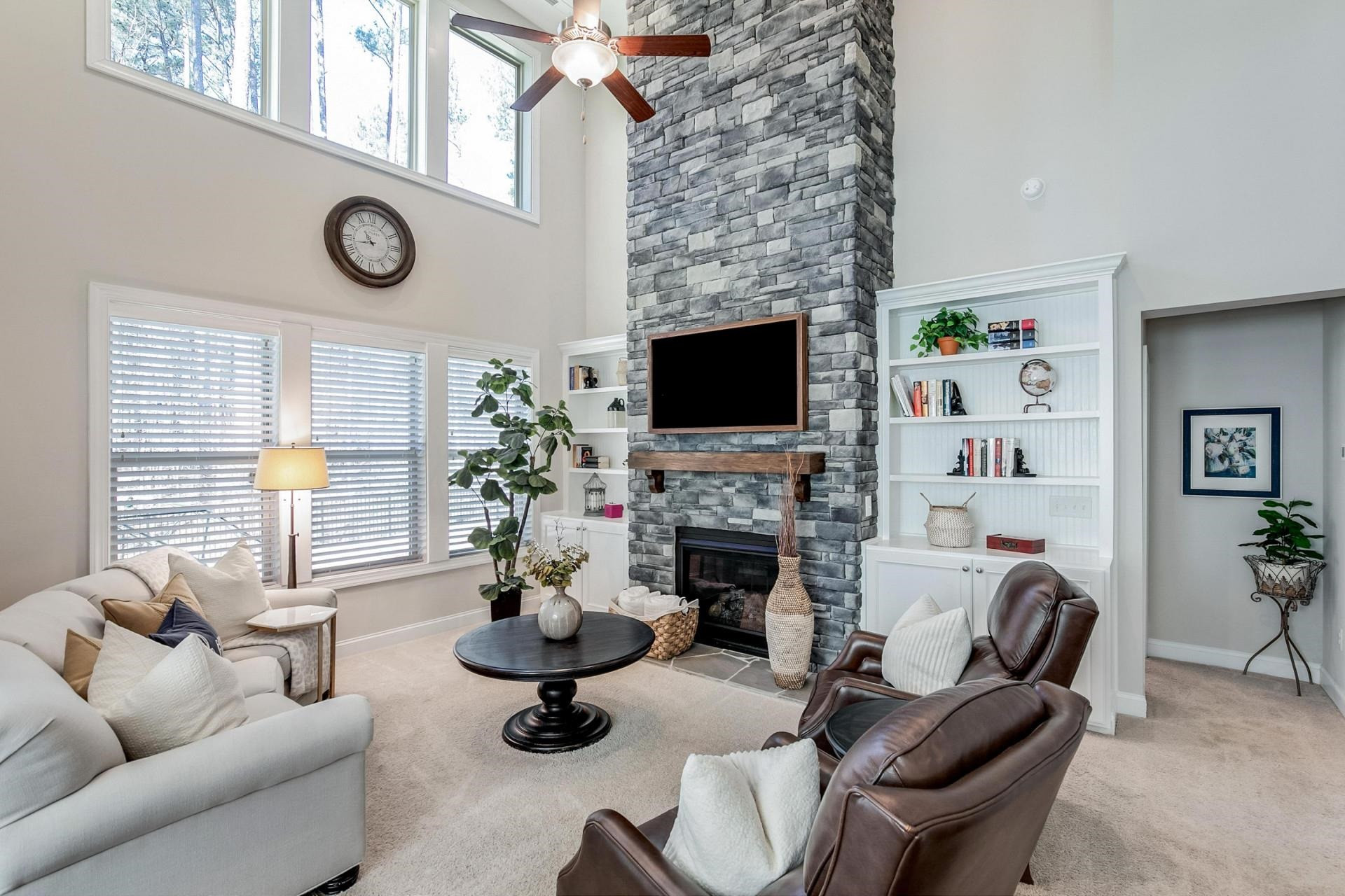 1016 Capstone Drive Durham, NC 27713 - Photo 14 of 50 a living room with furniture and a fireplace