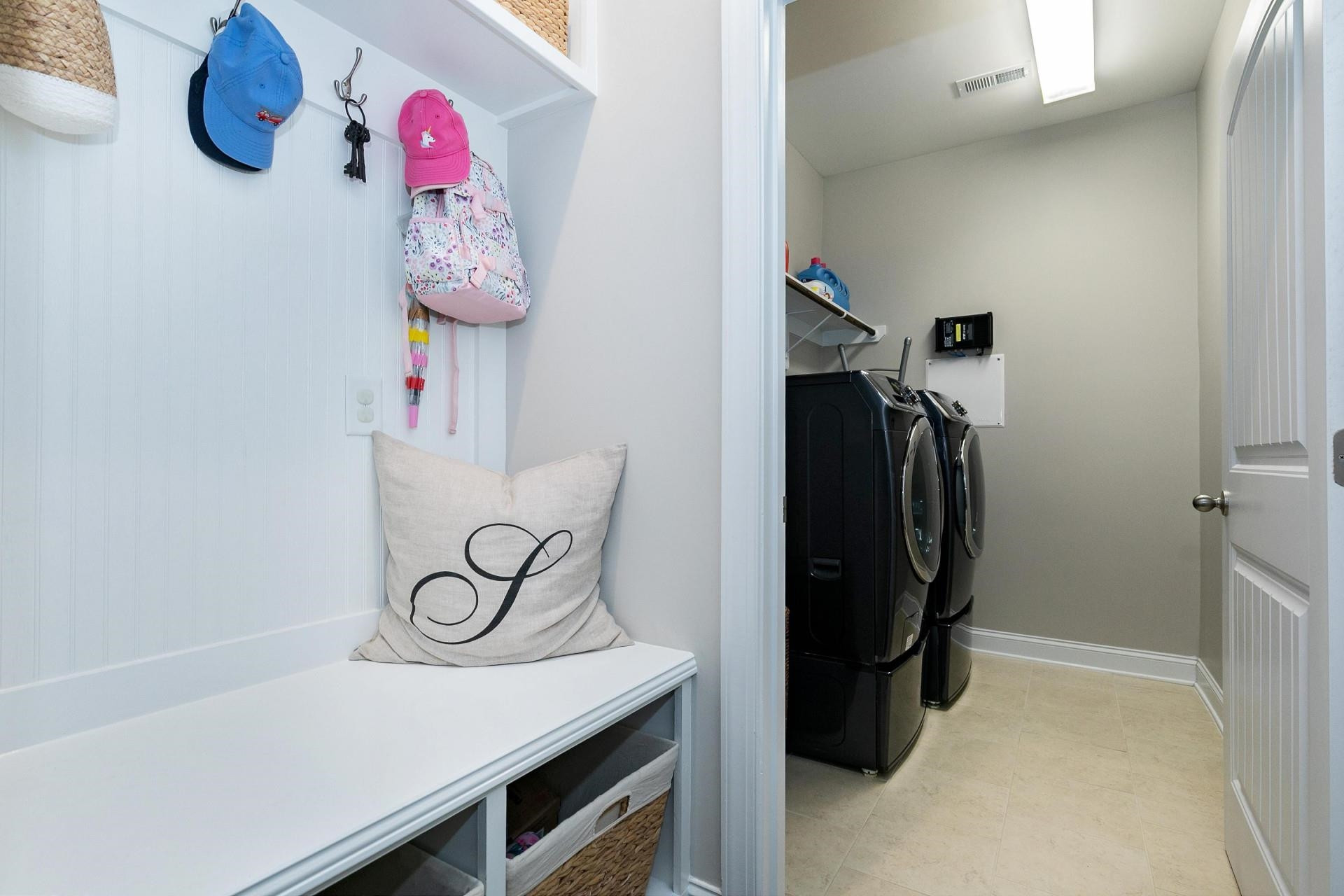 1016 Capstone Drive Durham, NC 27713 - Photo 24 of 50 a view of walk in closet with clothes and shoes
