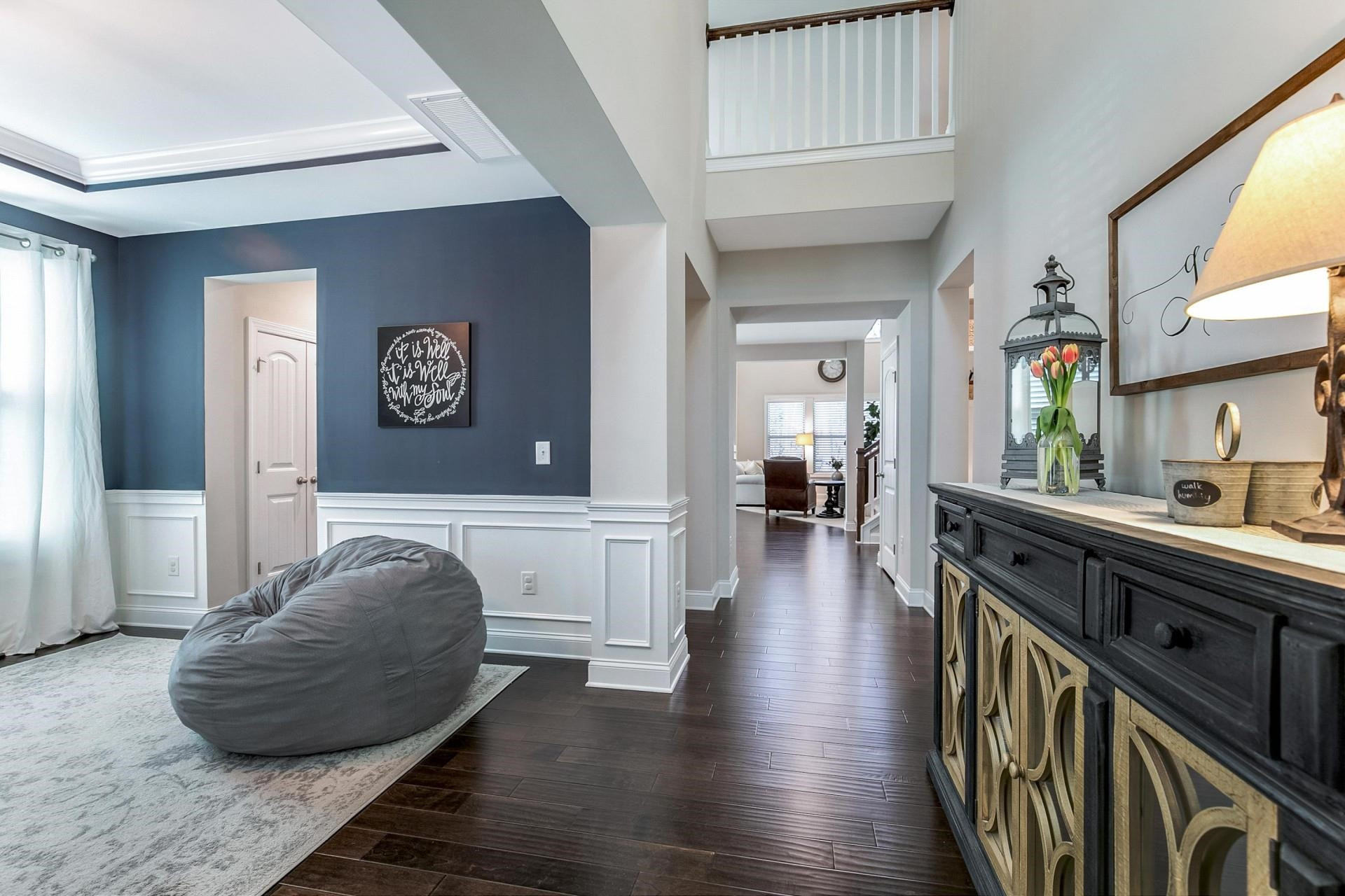 1016 Capstone Drive Durham, NC 27713 - Photo 3 of 50 a living room with furniture and a wooden floor
