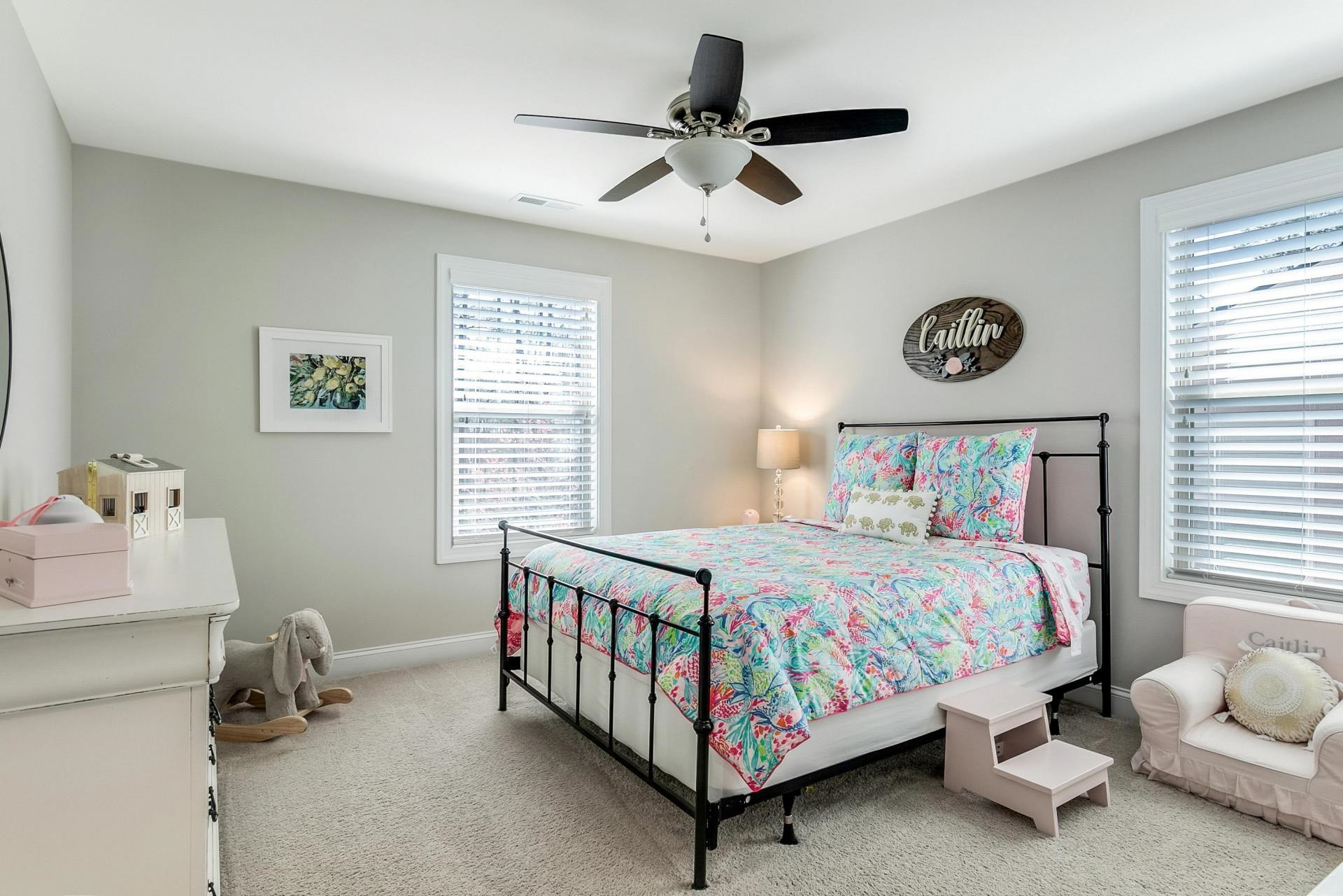 1016 Capstone Drive Durham, NC 27713 - Photo 31 of 50 a bedroom with a bed and a window
