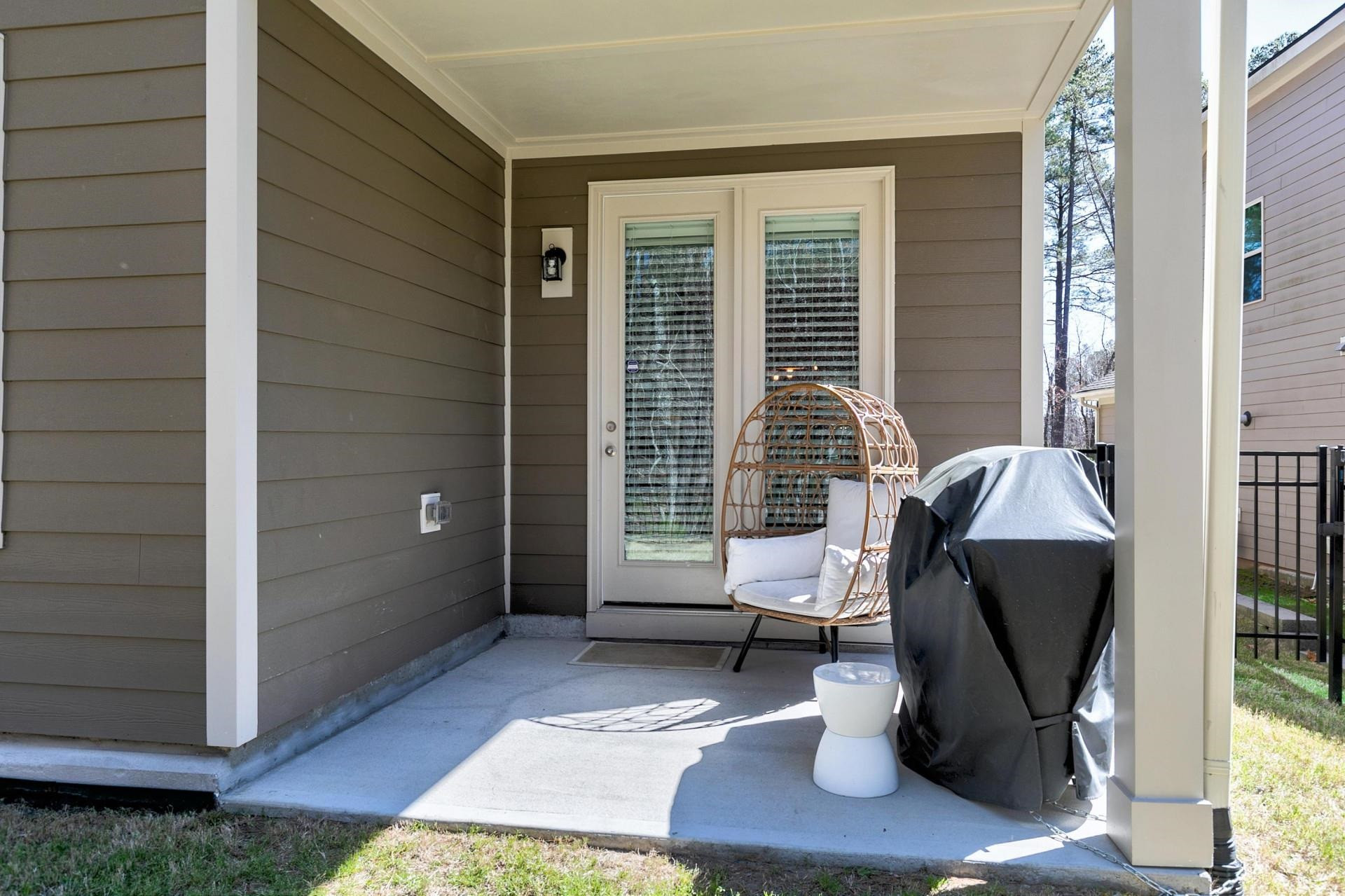 1016 Capstone Drive Durham, NC 27713 - Photo 39 of 50 a living room with furniture and a window