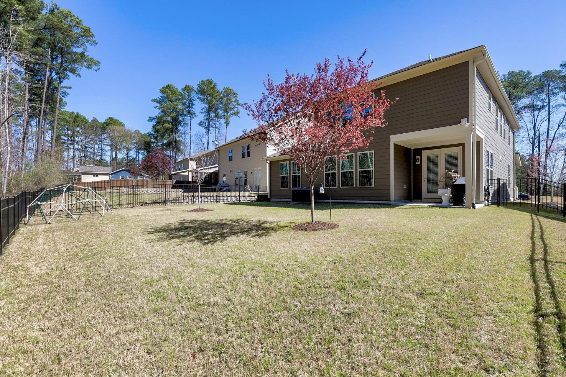 1016 Capstone Drive Durham, NC 27713 - Photo 40 of 50 a view of a house with a snow on the wall