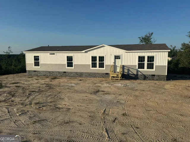 a front view of house with yard