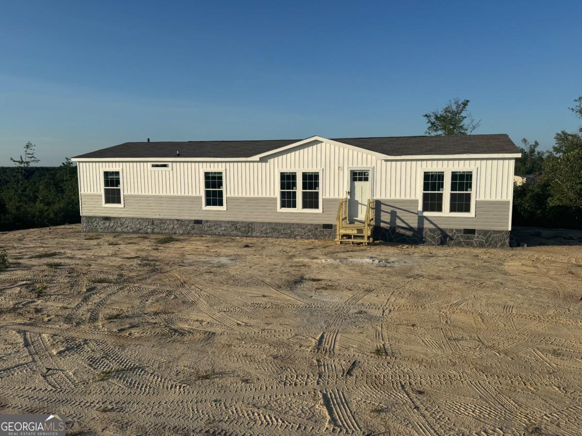 a front view of house with yard