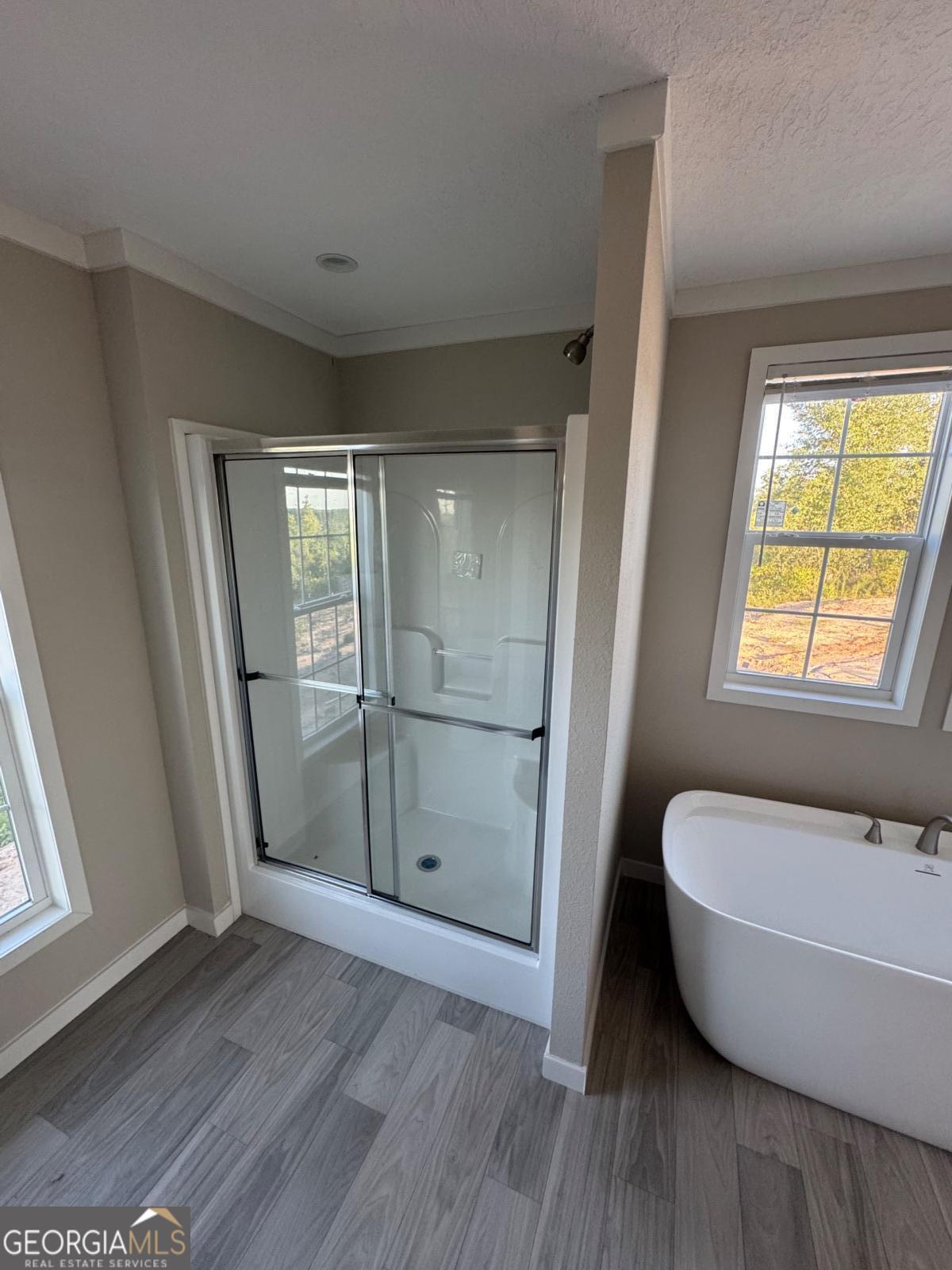 70 Long Leaf Road Hazlehurst, GA 31539 - Photo 17 of 17 a bathroom with a tub and shower