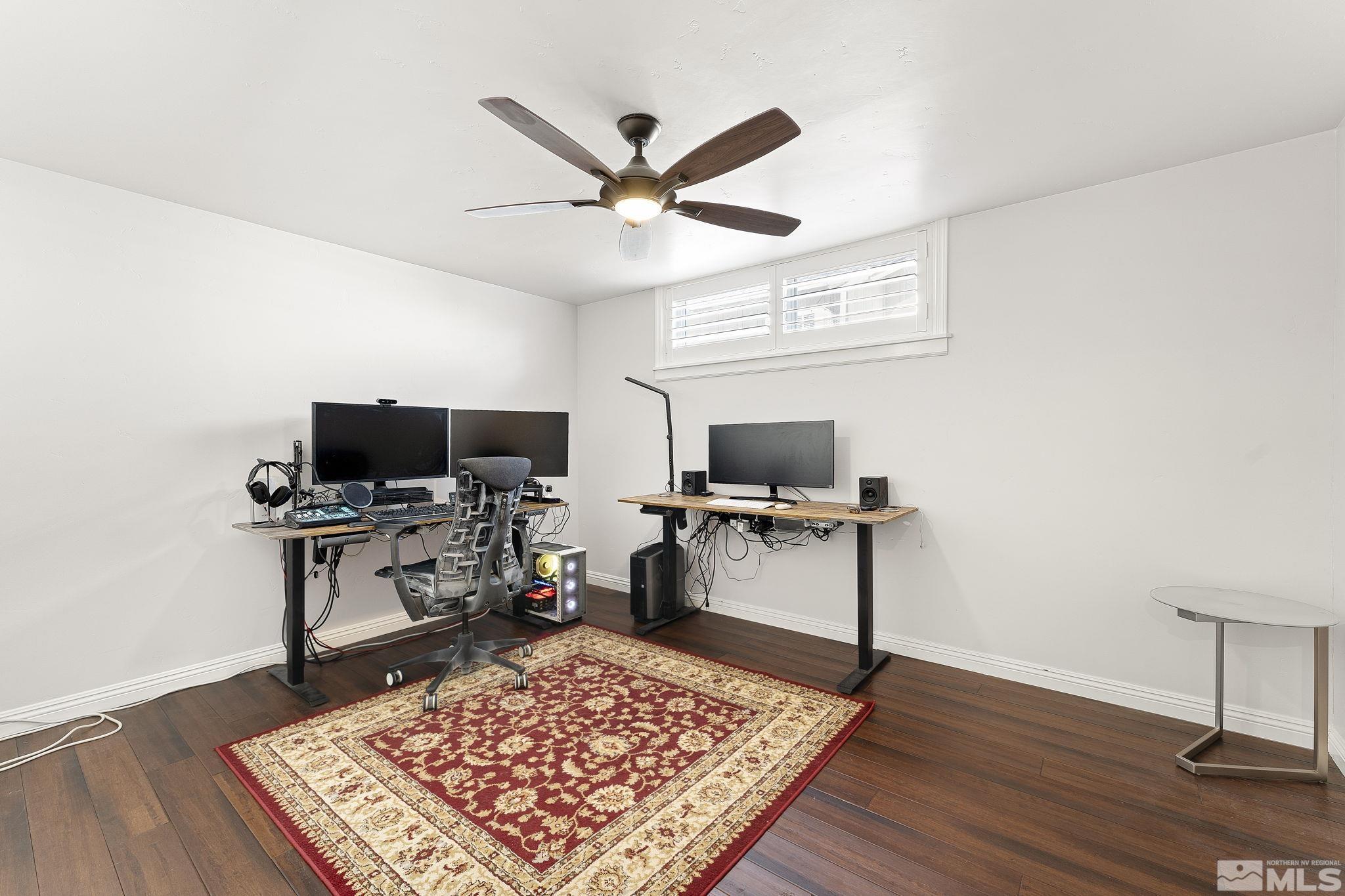 1890 Carlin Street Reno, NV 89503 - Photo 28 of 40 a living room with a flat screen tv and a rug
