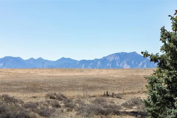 a view of an outdoor space with mountain view