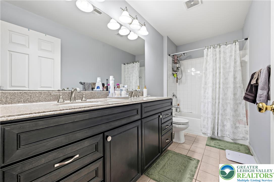 130 Lower Way Road Easton, PA 18045 - Photo 29 of 56 a bathroom with a double vanity sink mirror and shower