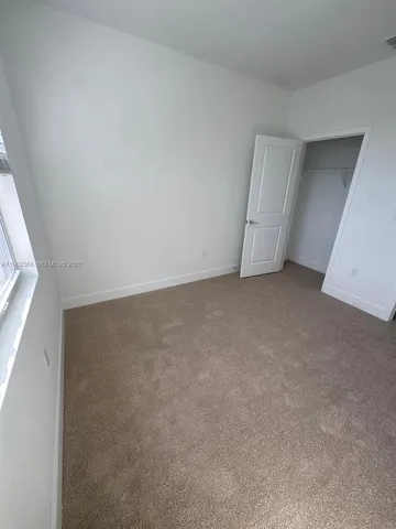 a view of a big room with closet