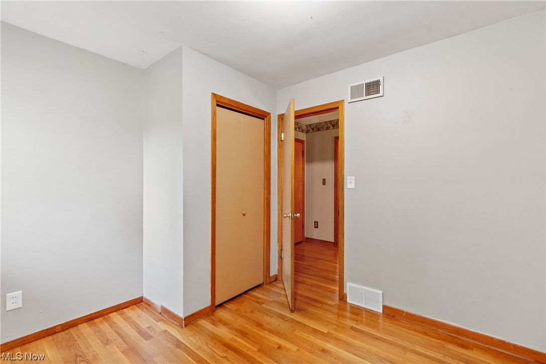 120 Lester Road New Franklin, OH 44319 - Photo 19 of 24 View of hardwood floored bedroom