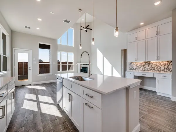 a view of living room with granite countertop furniture and fireplace