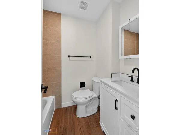 a bathroom with a sink and a toilet