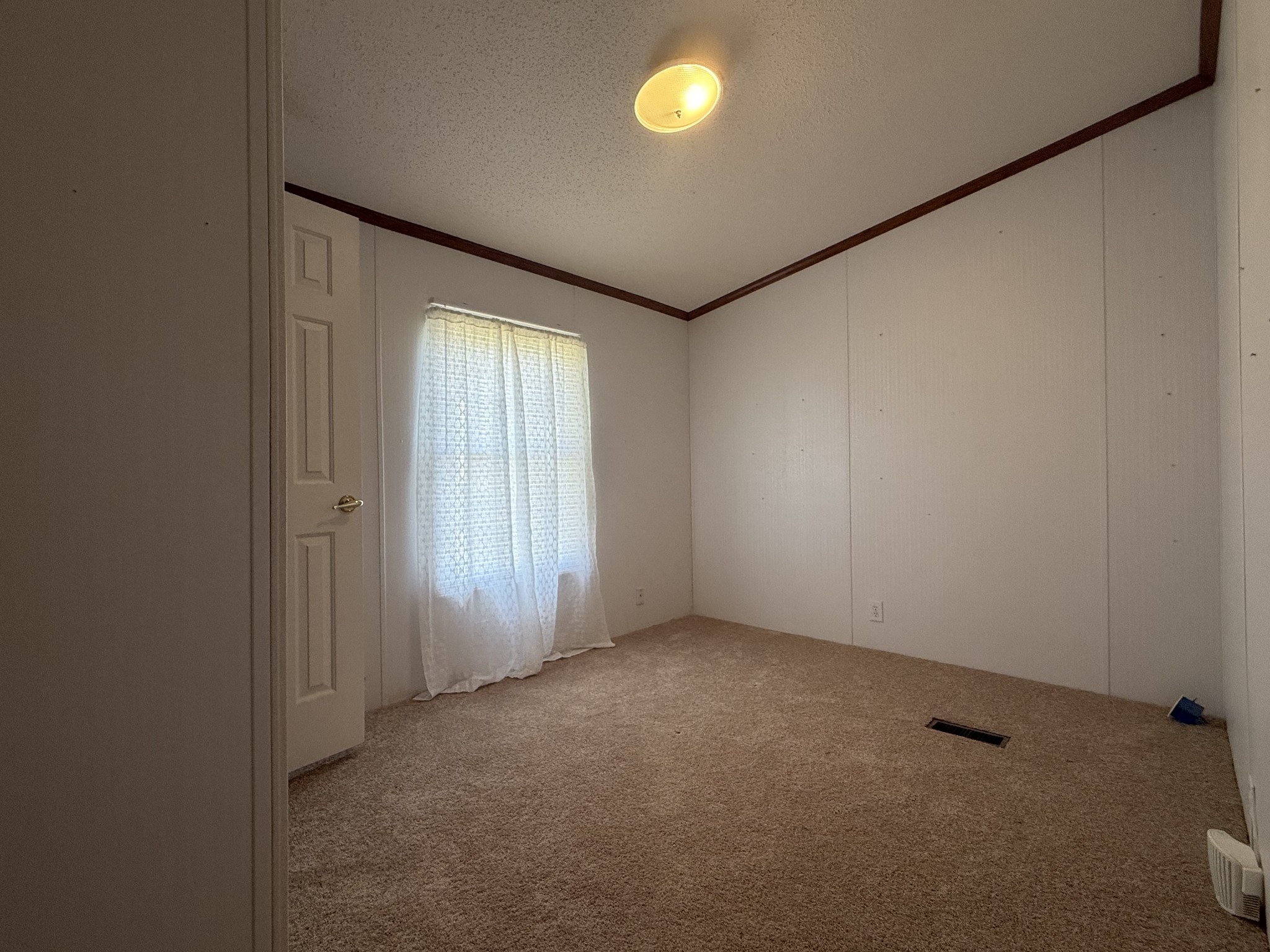 501 Post Road Michie, TN 38357 - Photo 19 of 21 an empty room with windows