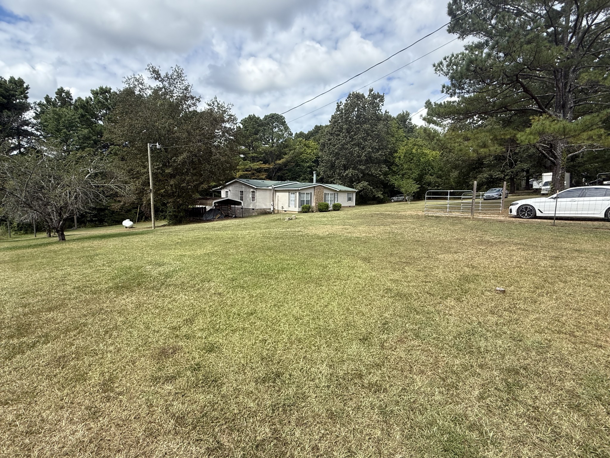 501 Post Road Michie, TN 38357 - Photo 5 of 21 a swimming pool with trees in the background