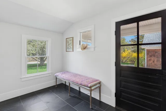 a view of kitchen with furniture and window
