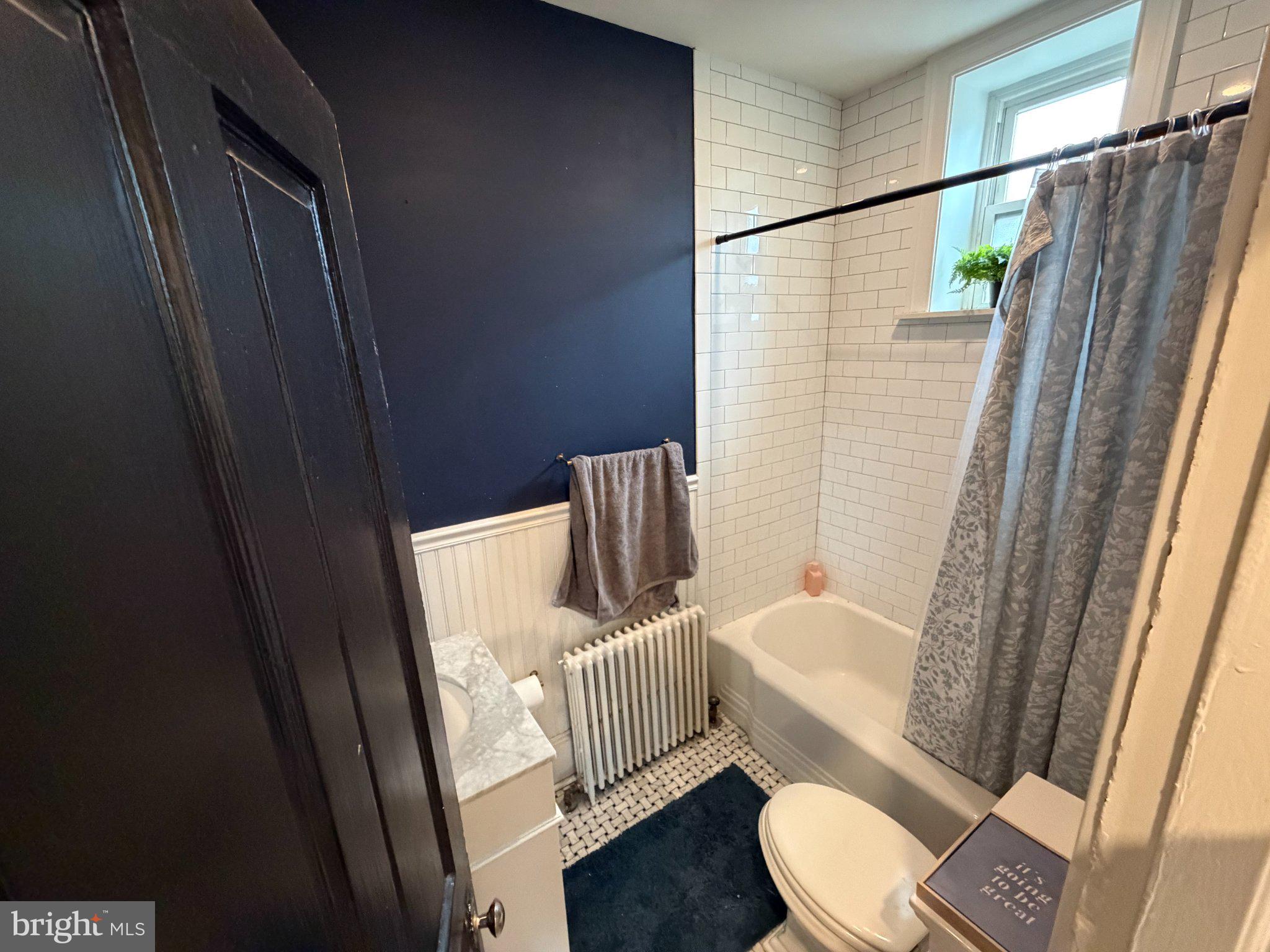 815 South 49th Street Philadelphia, PA 19143 - Photo 21 of 72 a bathroom with a toilet and a shower