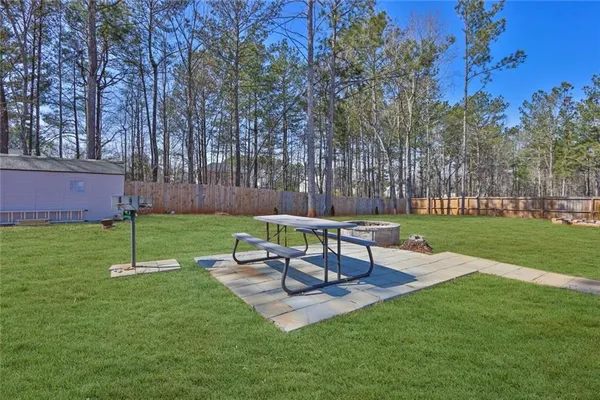 a view of a house with a big yard