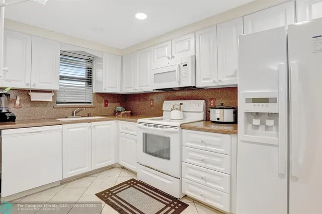 $299,000 | 2430 DC Country Club Boulevard, Unit 4012, Deerfield Beach, FL 33442