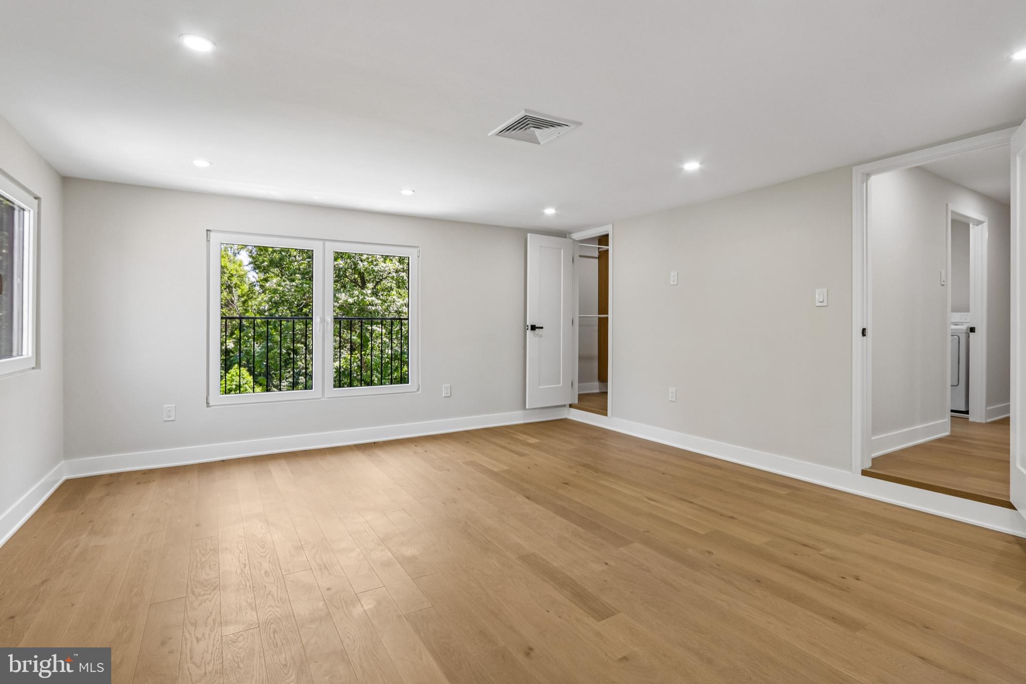 444 Rocksville Road Southampton, PA 18966 - Photo 33 of 72 an empty room with wooden floor and windows