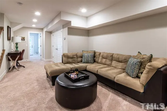 a living room with furniture and a couch