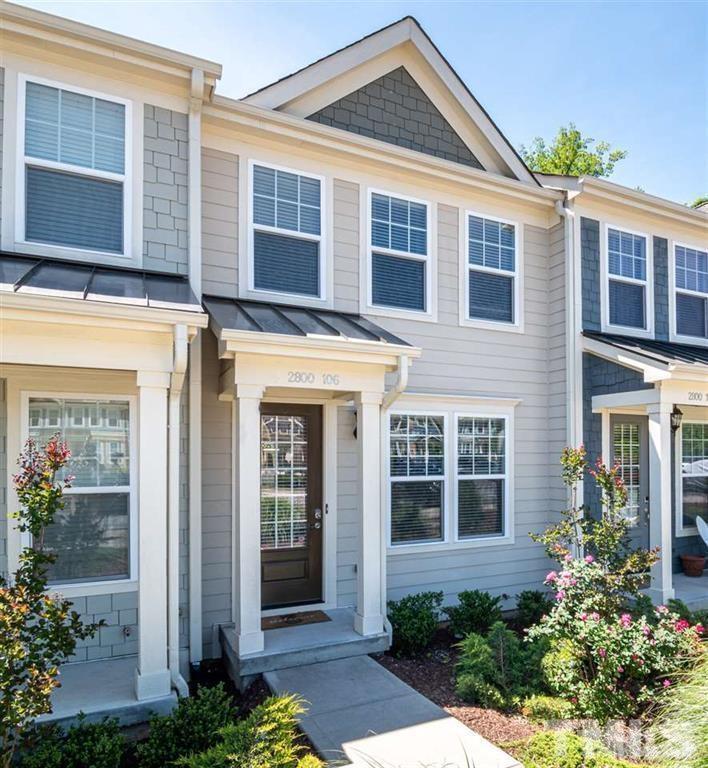 2800 Bedford Green Drive, Unit 106 Raleigh, NC 27604 - Photo 2 of 26 a front view of a house with a yard