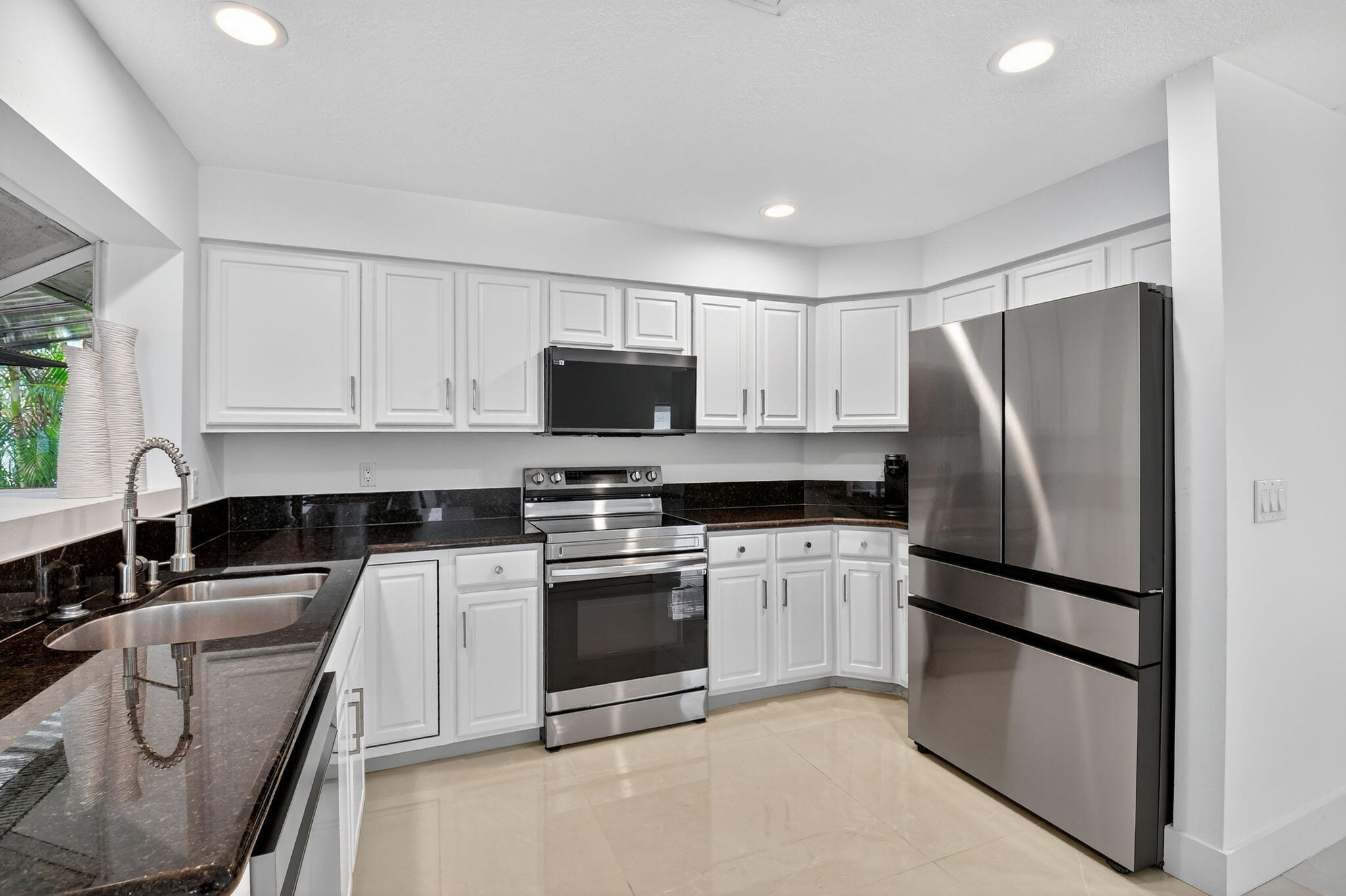 2218 Northwest 52nd Street Boca Raton, FL 33496 - Photo 10 of 47 Kitchen