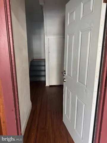 a view of entryway with wooden floor