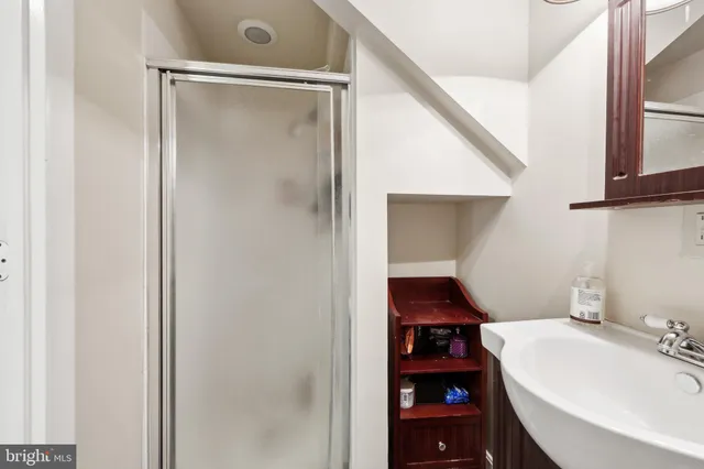 a bathroom with a sink and vanity
