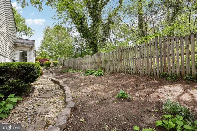 a view of backyard with green space