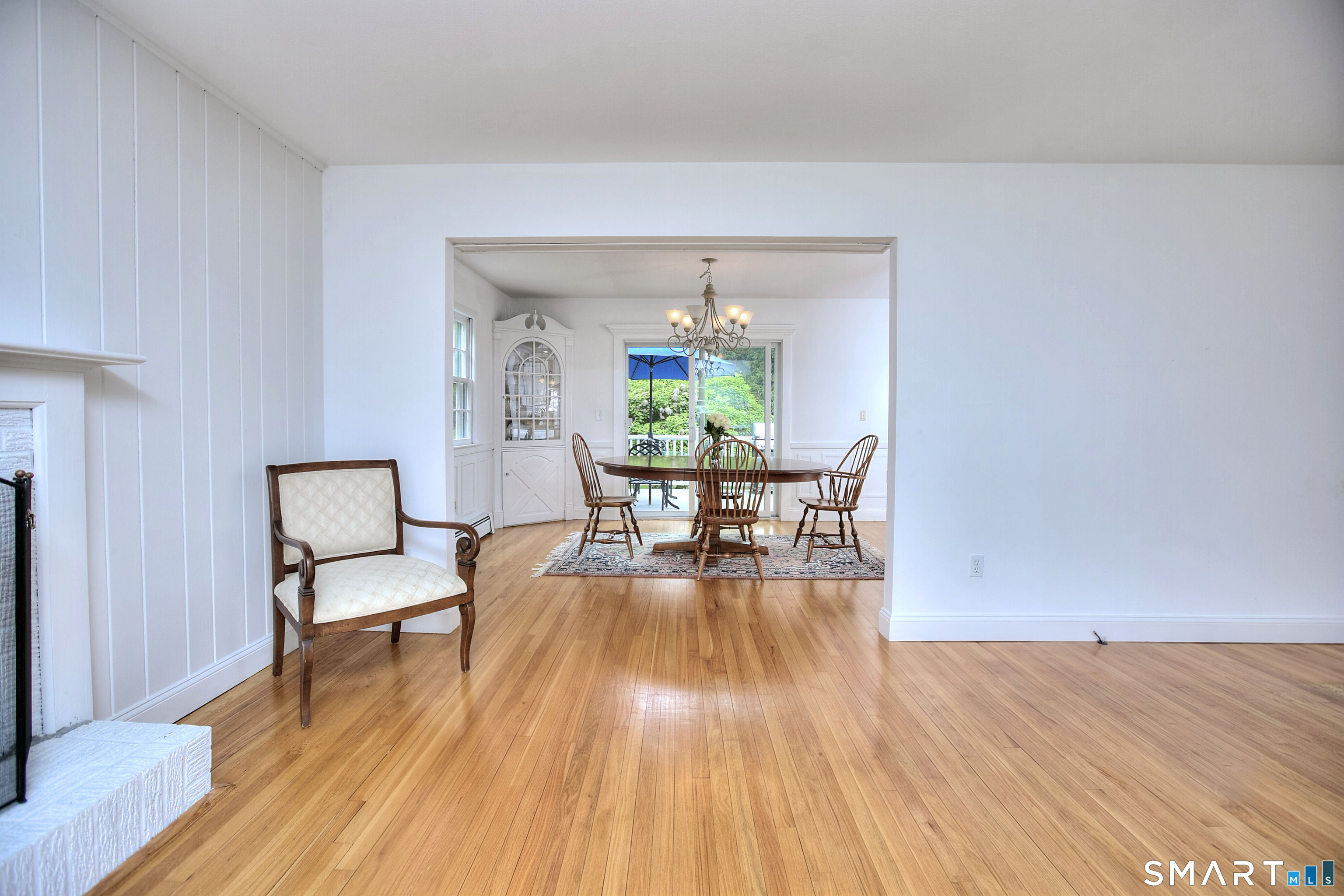 324 Ridge Road Orange, CT 06477 - Photo 4 of 38 a living room with furniture and a wooden floor