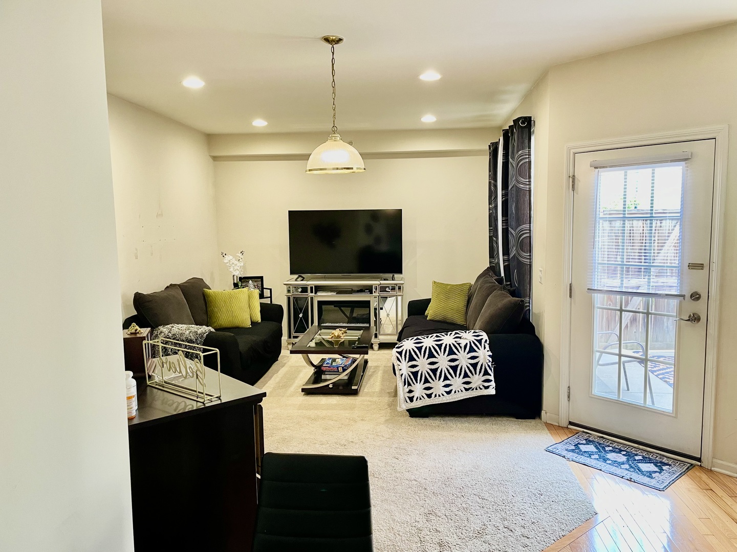 2018 Shermer Road, Unit 2018 Glenview, IL 60026 - Photo 13 of 39 a view of a livingroom with workspace and a window