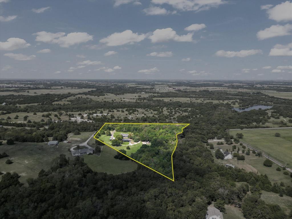 946 Burke Road Gunter, TX 75058 - Photo 35 of 38 Aerial overview of property's location featuring a nearby body of water and property parcel outlined