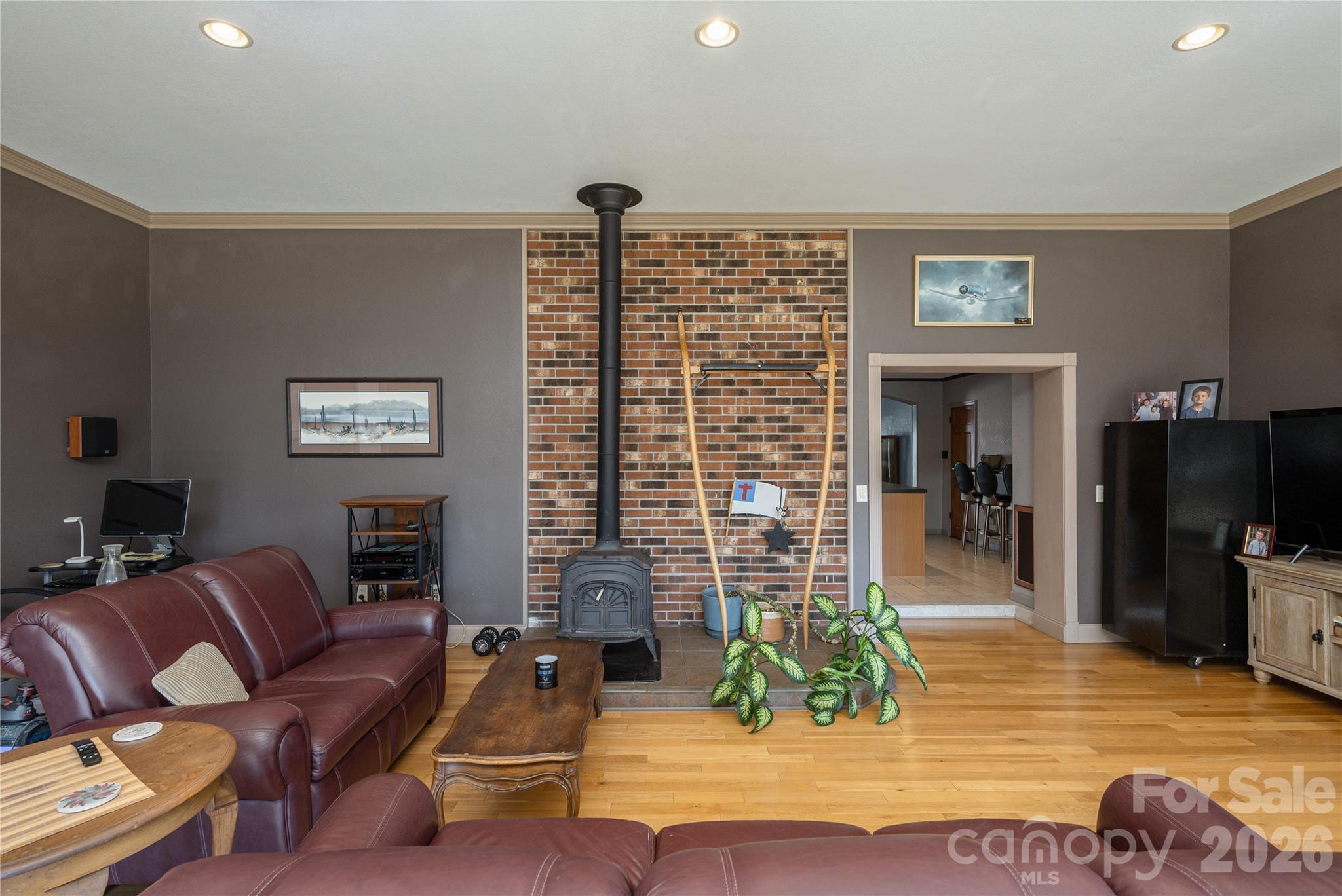 231 Allen Road East Flat Rock, NC 28726 - Photo 13 of 42 a living room with furniture and a flat screen tv