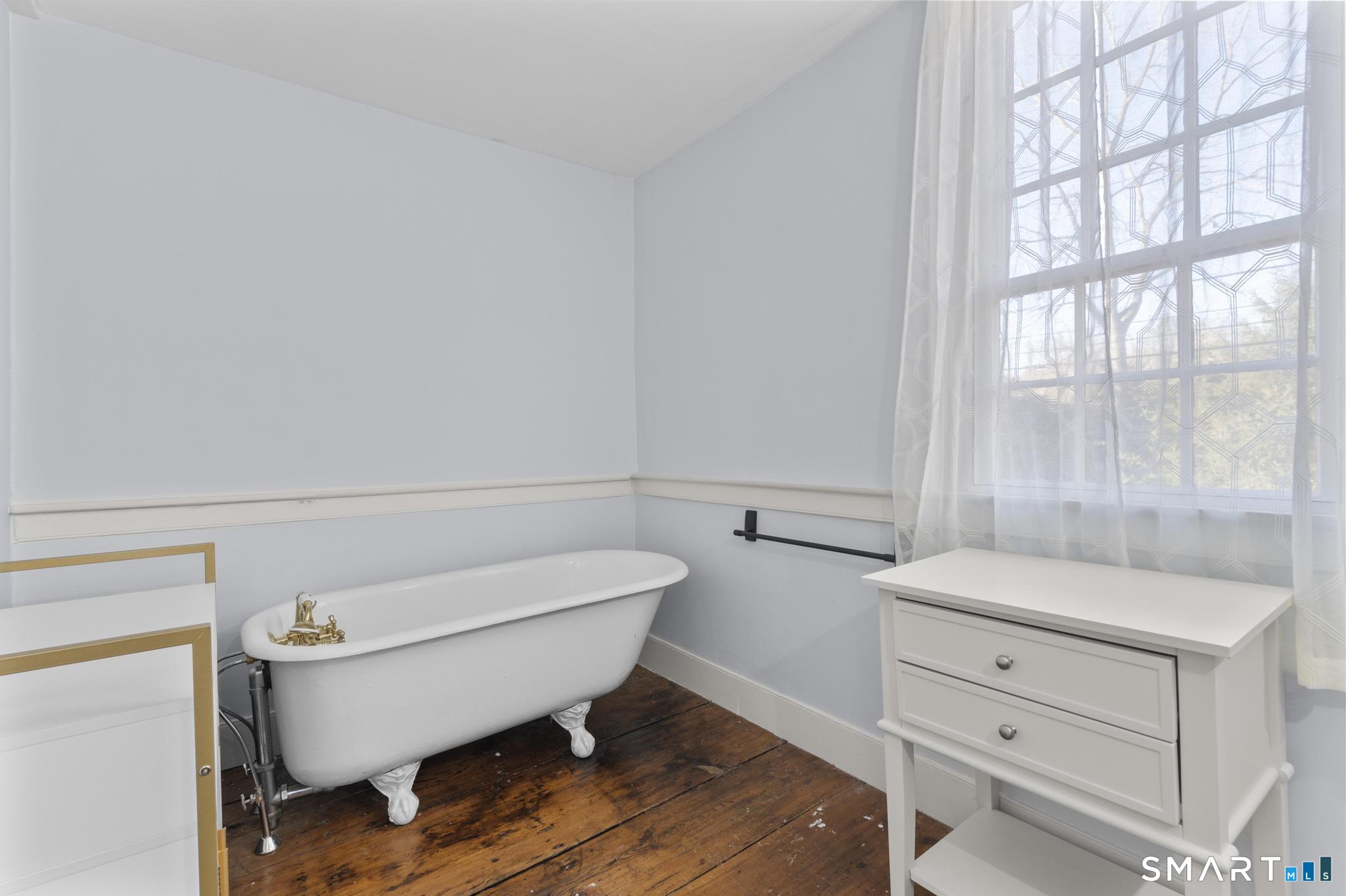 1 Ferry Road Chester, CT 06412 - Photo 13 of 40 a bathroom with a toilet and a bathtub