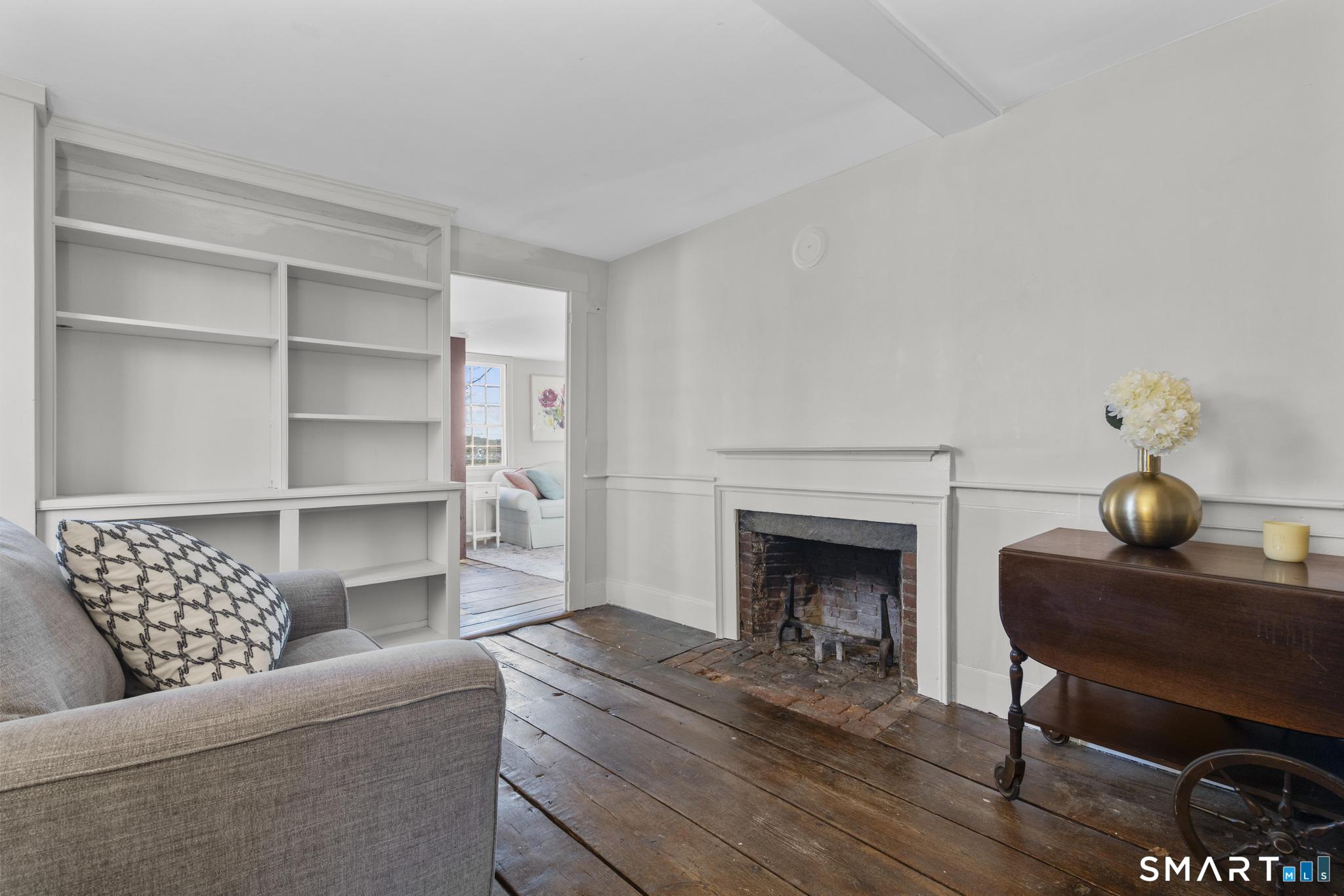 1 Ferry Road Chester, CT 06412 - Photo 14 of 40 a living room with furniture and a fireplace