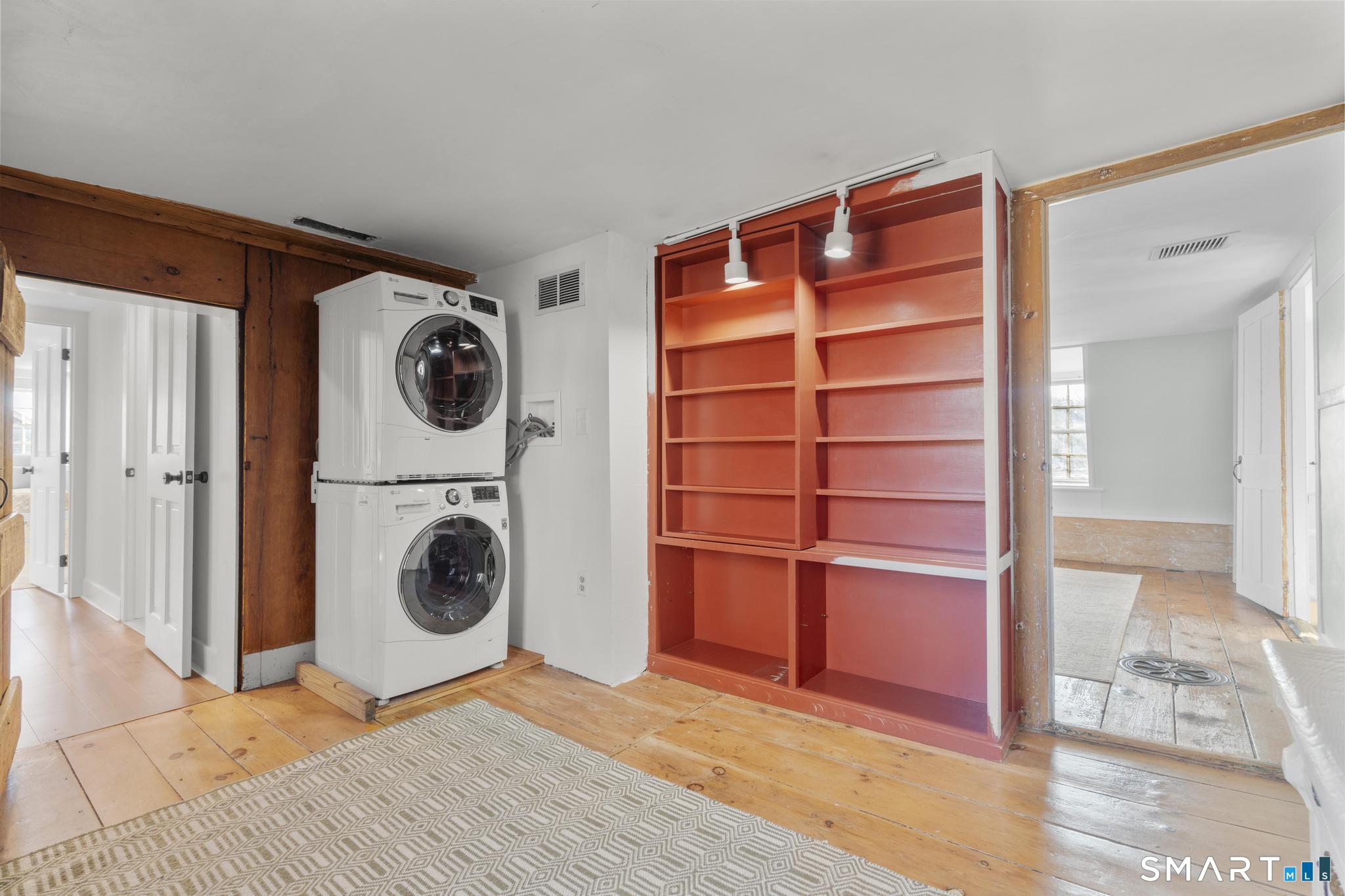 1 Ferry Road Chester, CT 06412 - Photo 22 of 40 a view of a storage & utility room with washer and dryer