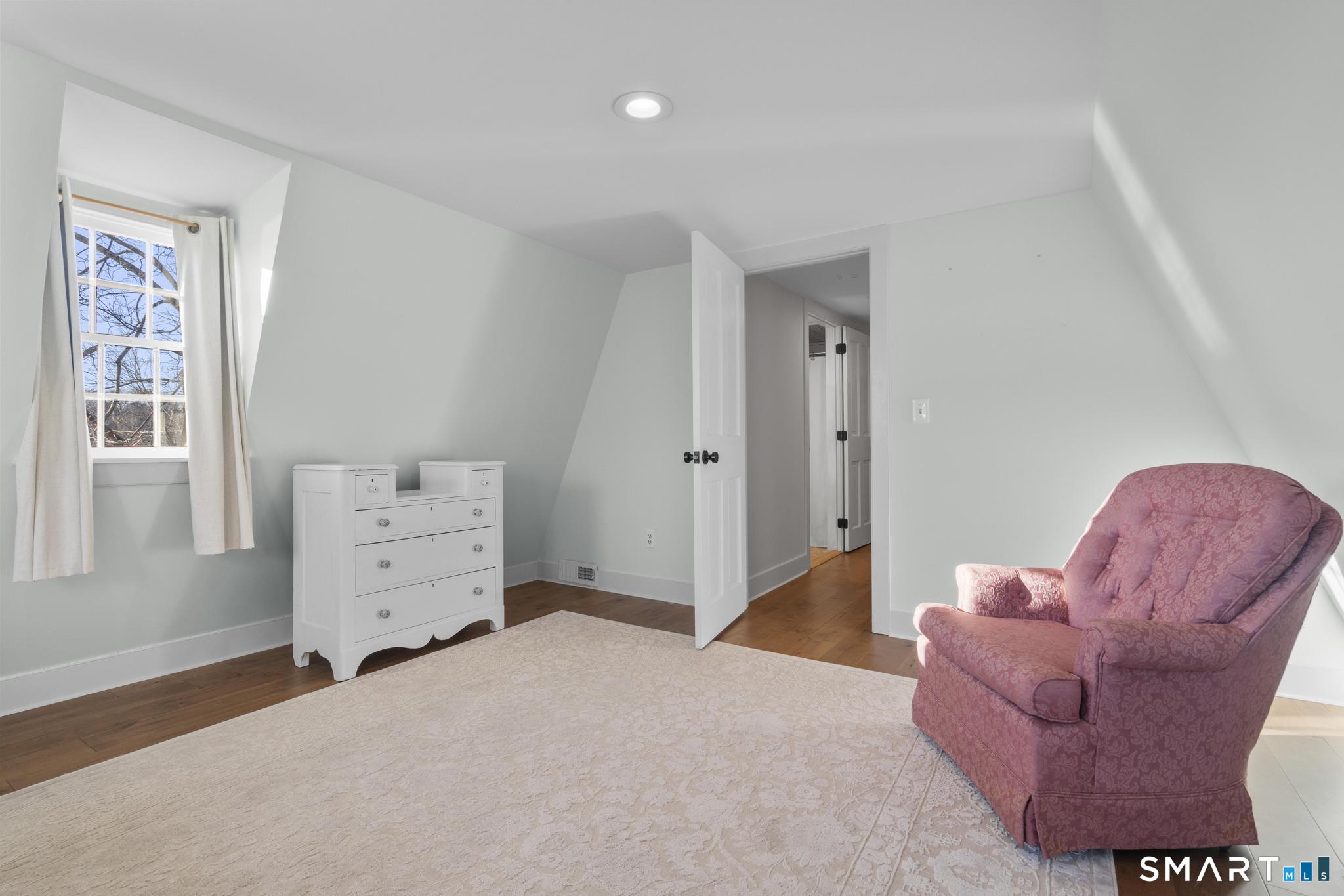 1 Ferry Road Chester, CT 06412 - Photo 24 of 40 a bedroom with furniture and a window