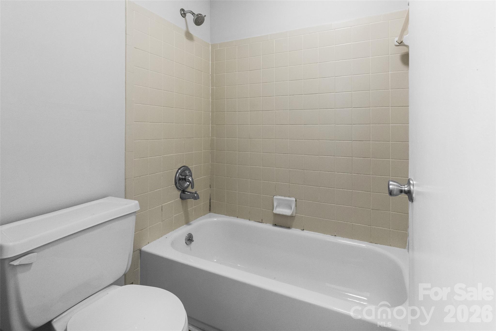 5016 Sardis Road, Unit C Charlotte, NC 28270 - Photo 14 of 25 a white bath tub sitting next to a white toilet