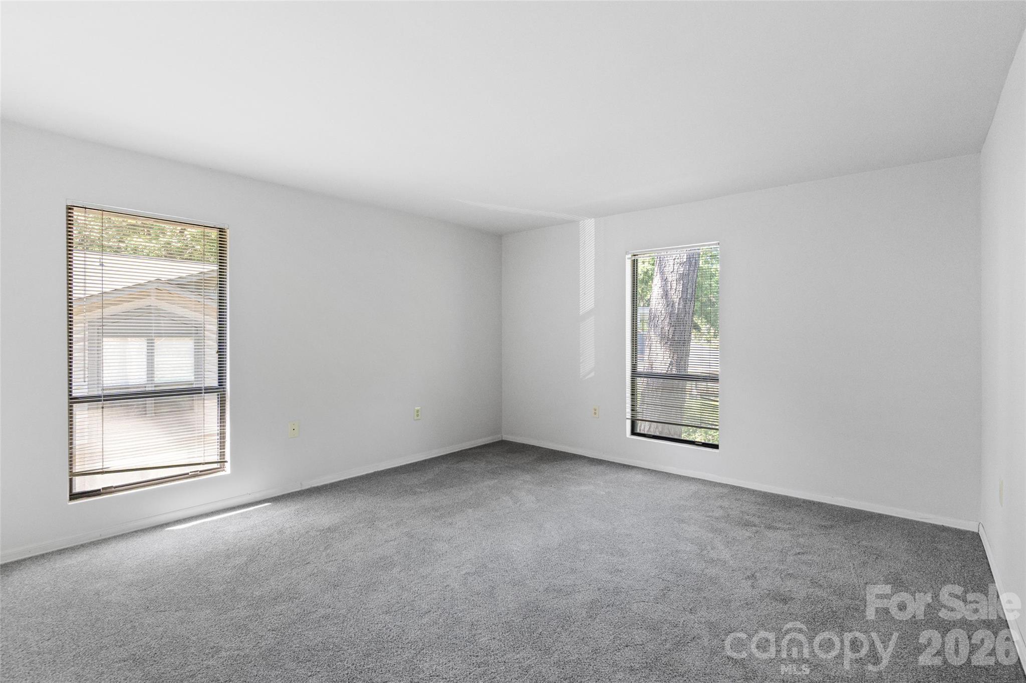 5016 Sardis Road, Unit C Charlotte, NC 28270 - Photo 15 of 25 an empty room with windows
