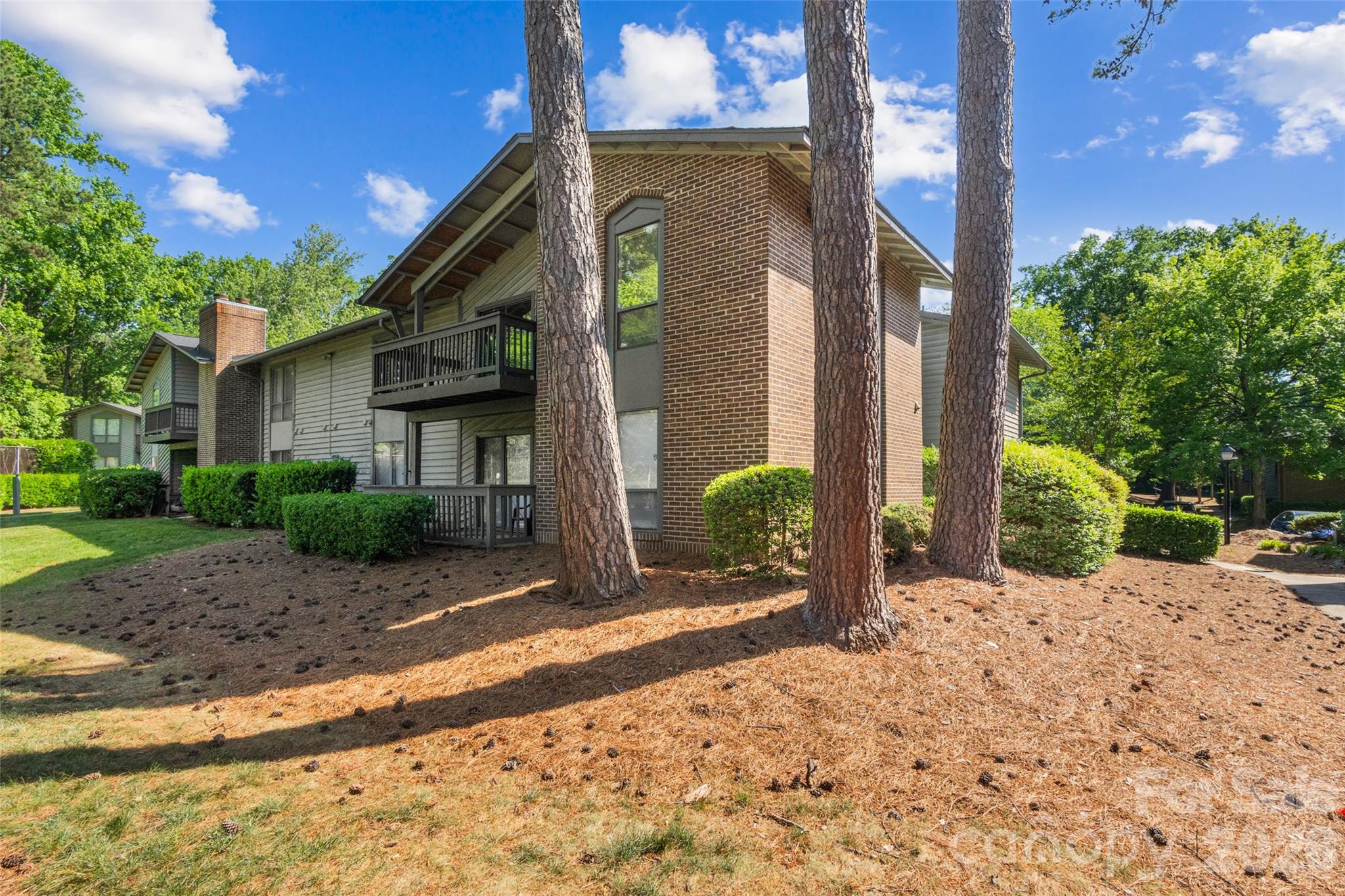 5016 Sardis Road, Unit C Charlotte, NC 28270 - Photo 21 of 25 a view of a house with backyard